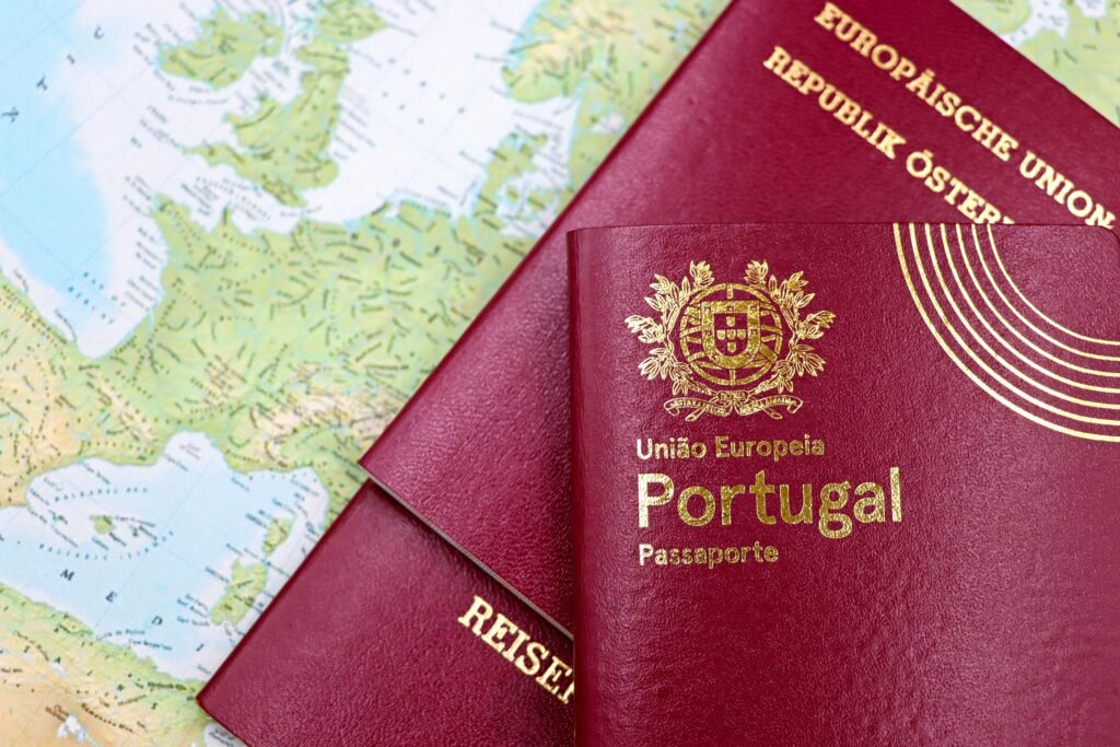pexels-photo-29402987-29402987 Close-up of Portuguese and Austrian passports lying on a map of Europe, symbolizing travel and mobility.