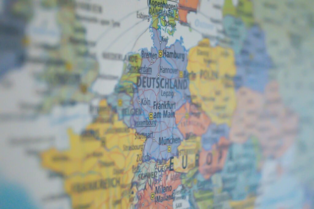 pexels-photo-269790-269790 Close-up view of Germany on a colorful world map showing major cities.